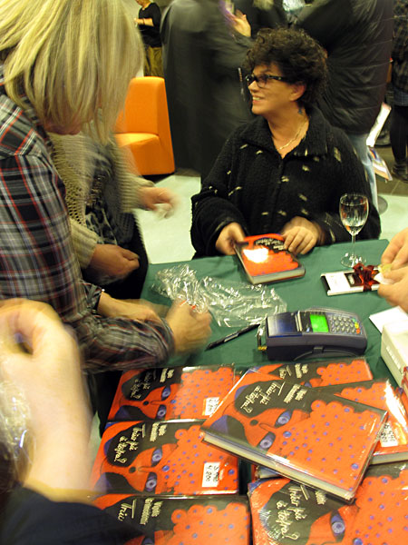 Reykjavík. The new book by Vigdís Grímsdóttir. And cats. - Vigdís signing her new book '<a href='http://www.forlagid.is/?p=585461&j_c=1044' target='_blank' class='linksnormal'>Trúir þú  töfra?</a>'. Til hamingju með bókin, Vigdís mín! (25 October 2011)