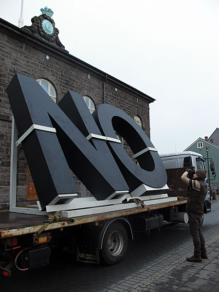 Reykjavík. 'NO Global Tour' by the artist Santiago Sierra. - 'NO Global Tour' by the artist <a href='http://www.santiago-sierra.com' target='_blank' class='linksnormal'>Santiago Sierra</a> infront of the icelandic parliament Alþingi. (16 January 2012)