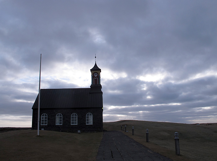 Reykjanes peninsula. Short round trip. - Hvalsneskirkja church south of  <a href='http://en.wikipedia.org/wiki/Sandgeri' target='_blank' class='linksnormal'>Sandgerði</a>, beside Garðskagavegur (road 45). The church was inaugurated in 1887, and build of ashlar (quarrystone?). (4 November 2012)