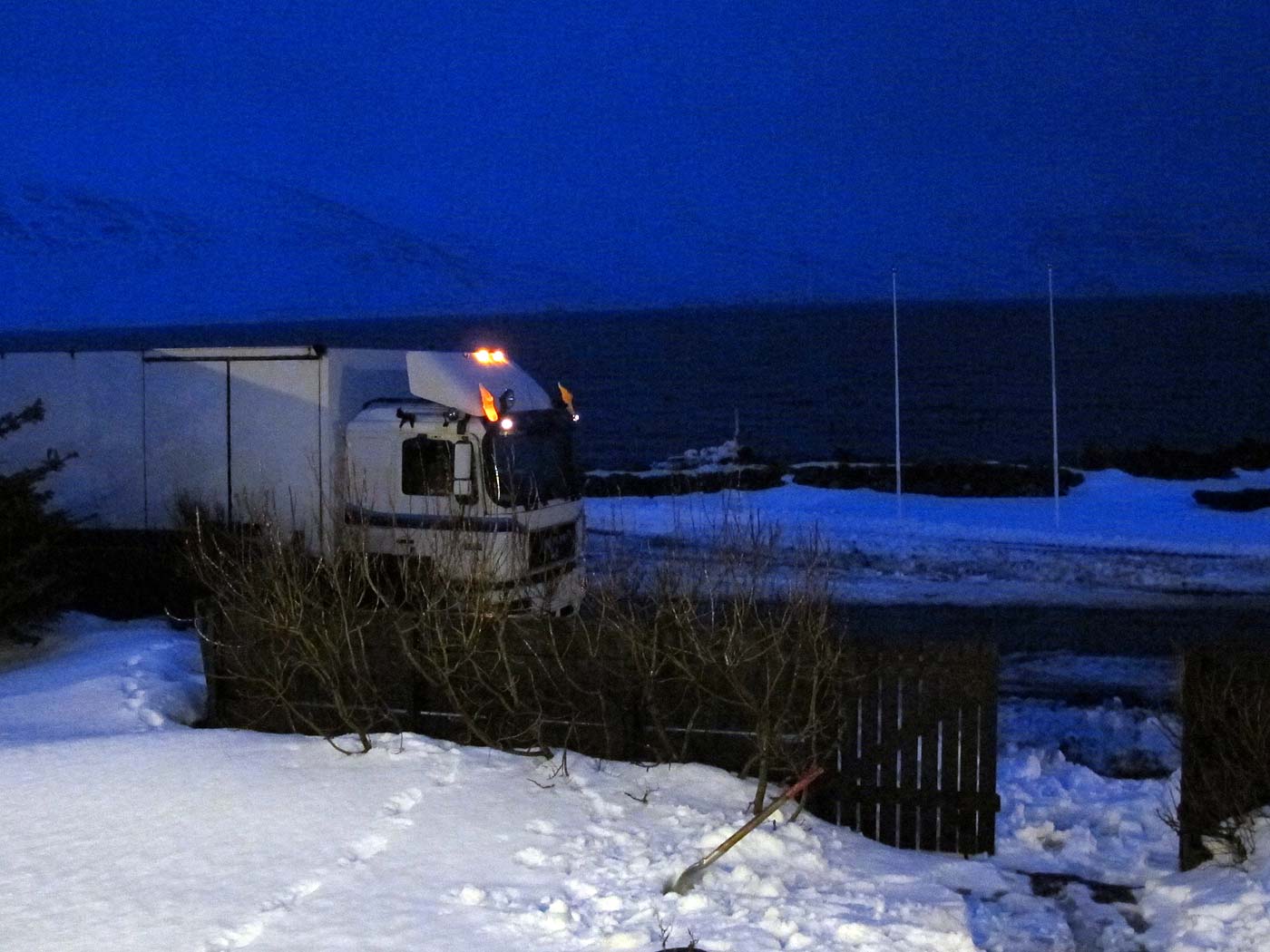 Djúpavík. Three days in Djúpavík. Friday. - Late in the evening a truck coming from Norðurfjörður passed Djúpavík, the driver stopped for a cup of coffee and a chat with Eva and Ási. (19 April 2013)