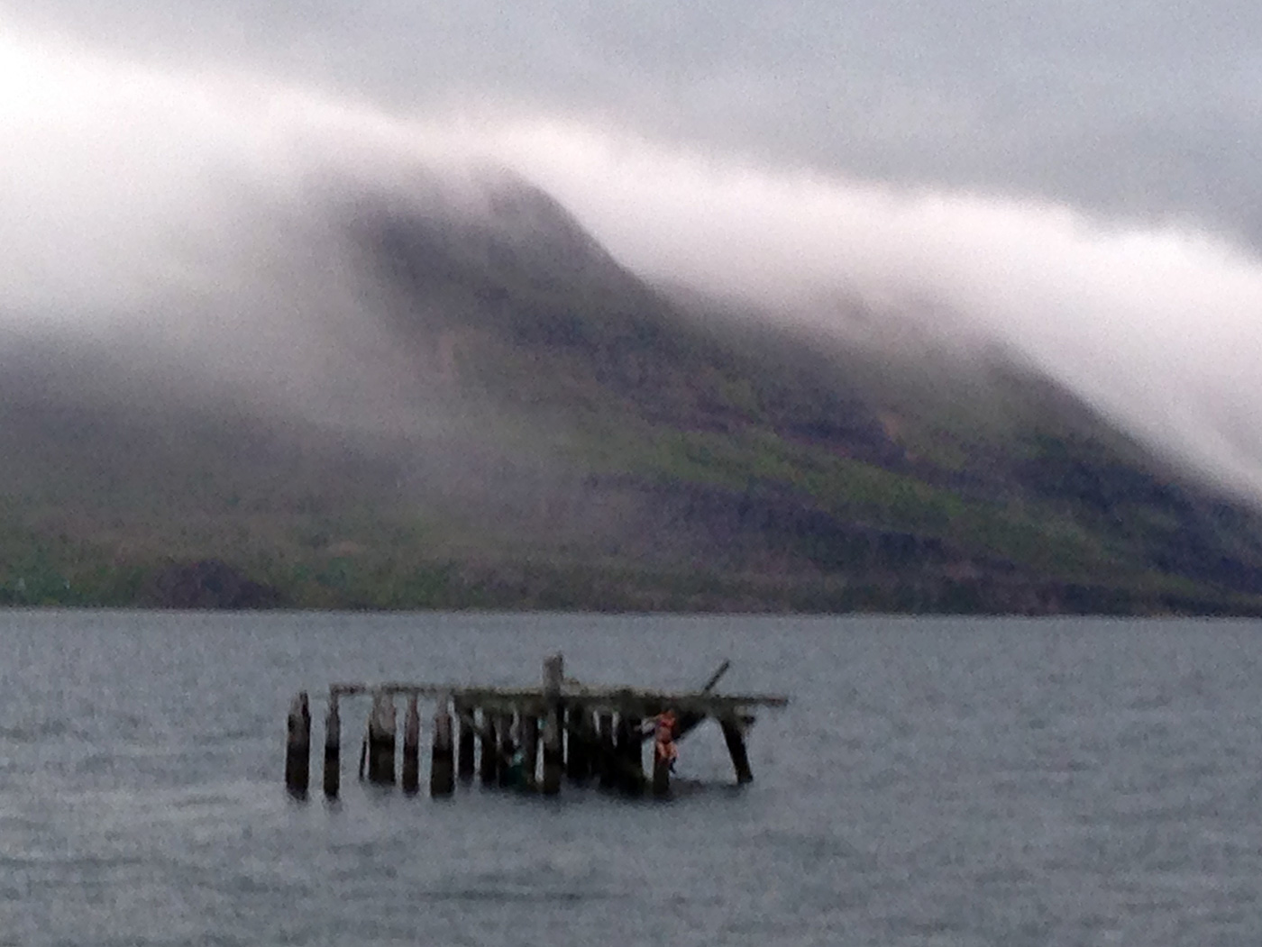 Djúpavík. Miscellaneous LXIII. - A 15 years young girl was swimming two times to the 'famous' rest of the jetty. Here you see her jumping from the jetty into the water ... Vá! (29 till 31 July 2013)