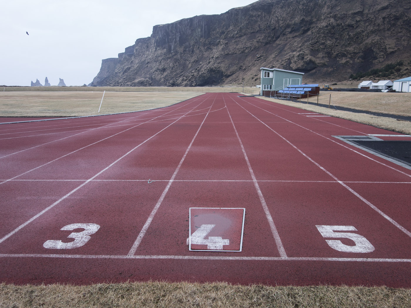 South Coast. Part 8 - Picture of 'somewhere between'. - Somewhere between. Again the sports field in <a href='http://en.wikipedia.org/wiki/V%C3%ADk_%C3%AD_Mrdal' target='_blank' class='linksnormal'>Vík í Mýrdal</a>, I would like to see a soccer match here :-). IV. (18 January 2014)