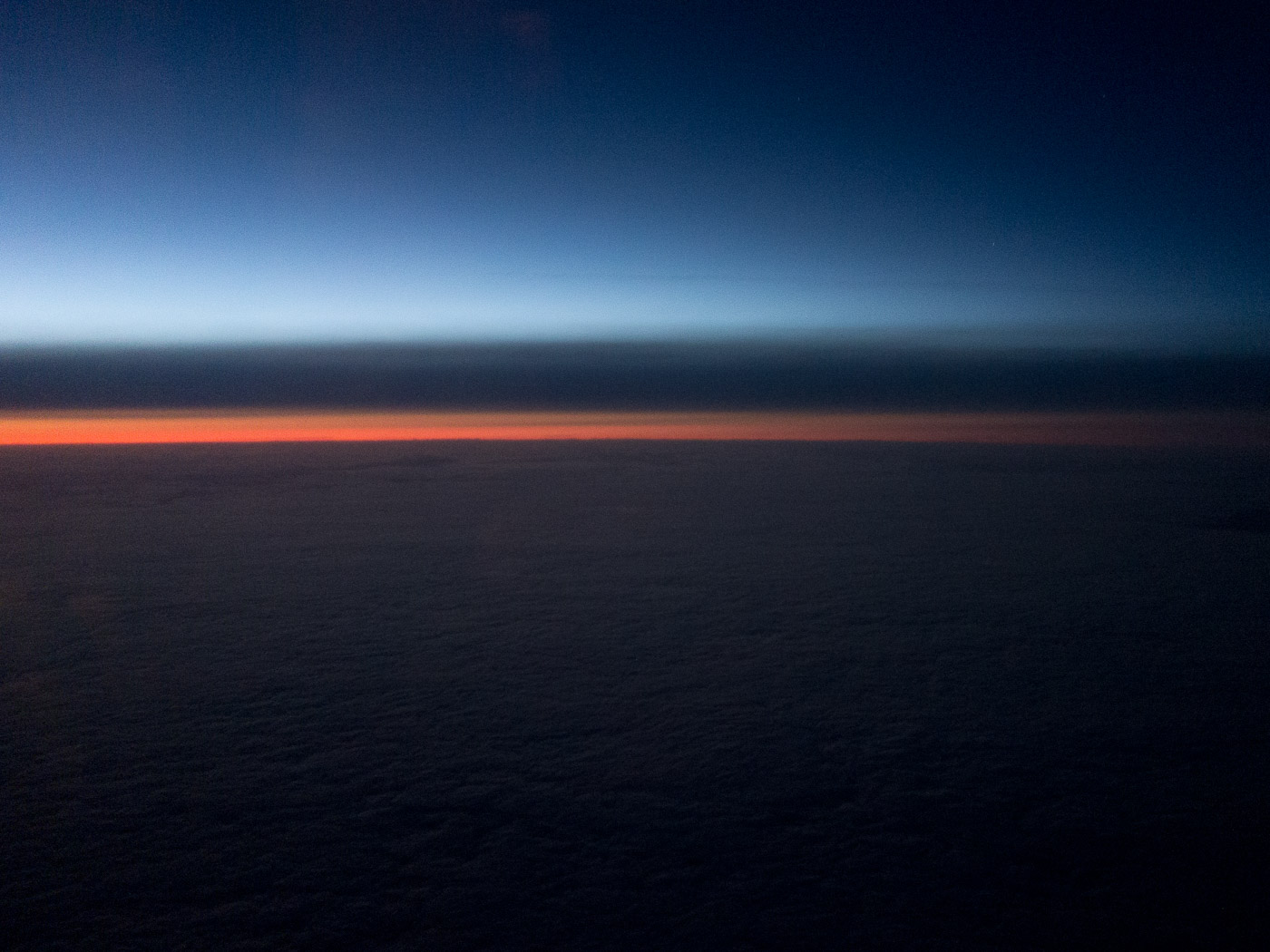 Reykjavík. Miscellaneous LXXXVIII. - I. Flying back to Iceland - above the clouds, after midnight. (12 till 31 August 2015)