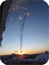 Sun meets ice.<br />(postcard, pk37)